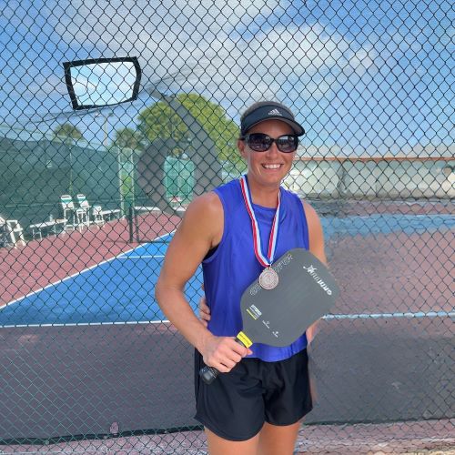 Kim Mihan is a pickleball instructor with suncoast pickleball training camps at dill dinkers in sarasota florida