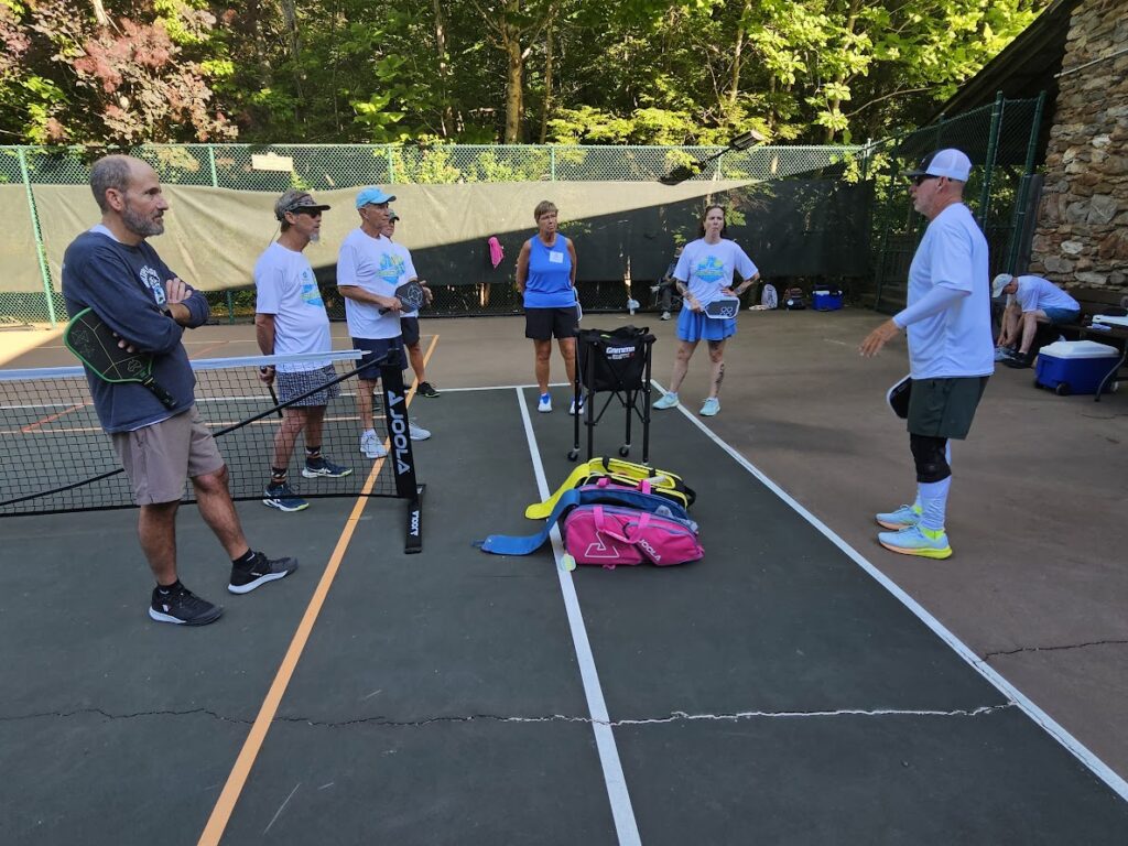 john sperling pickleball pro and owner training players at suncoast pickleball camp in montreat north carolina photo by norman weathersby